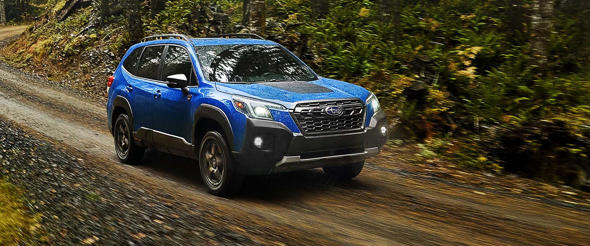 A 2022 Forester driving on a highway. | Dean Team Subaru in Ballwin MO