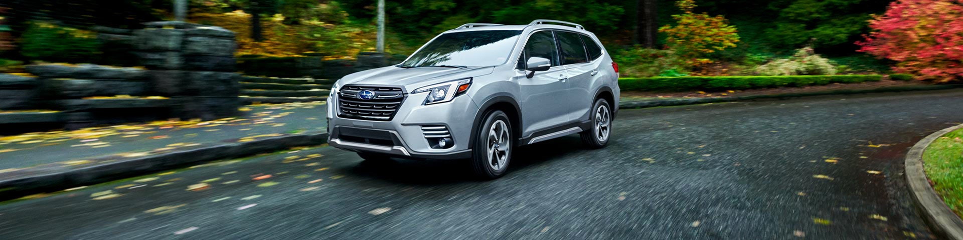 A 2022 Forester driving on a highway. | Dean Team Subaru in Ballwin MO