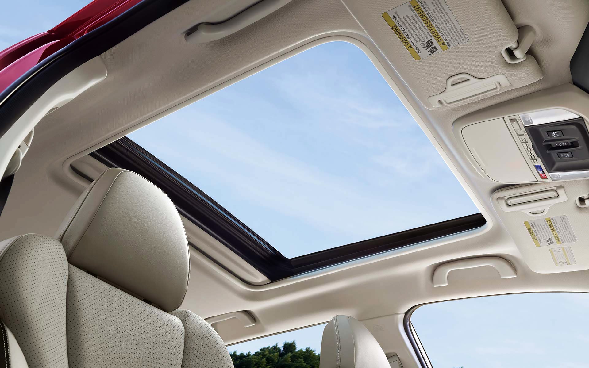 A view through the power sliding panoramic moonroof on the 2022 Forester Sport. | Dean Team Subaru in Ballwin MO